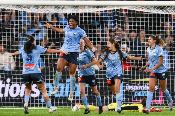 Madison Haley celebrates one of her two goals in Sydney FC’s grand final rout.
