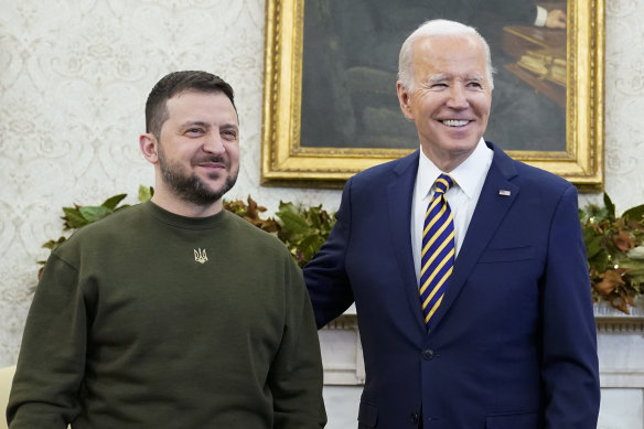 Dressed for the occasion in military fatigues, Ukrainian President Volodymyr Zelensky meets US President Joe Biden in the Oval Office of the White House on December 21.