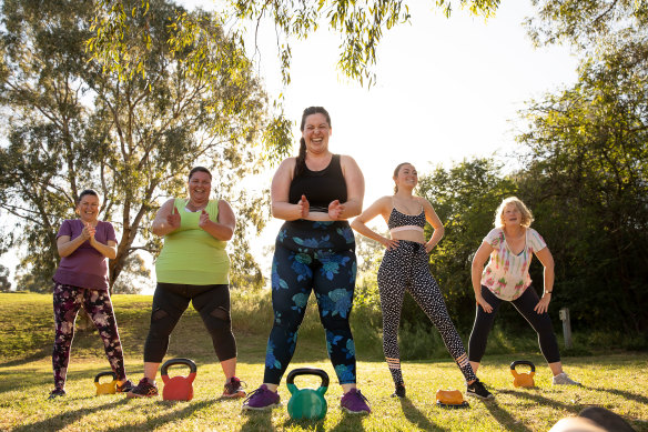 A photo from VicHealth's This Girl Can campaign, featuring trainer Natasha Korbut (centre).