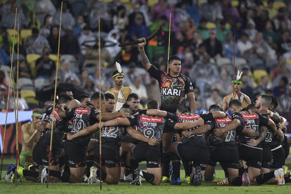 The Indigenous All Stars perform a war dance before the start of the NRL All Stars game.