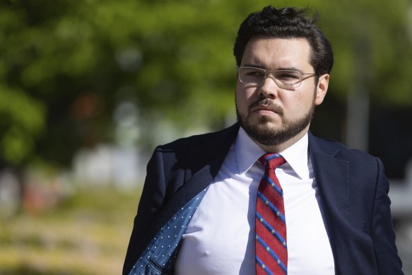 Bruce Lehrmann, arriving at court on Friday, denies raping Higgins and says the pair never had sex.