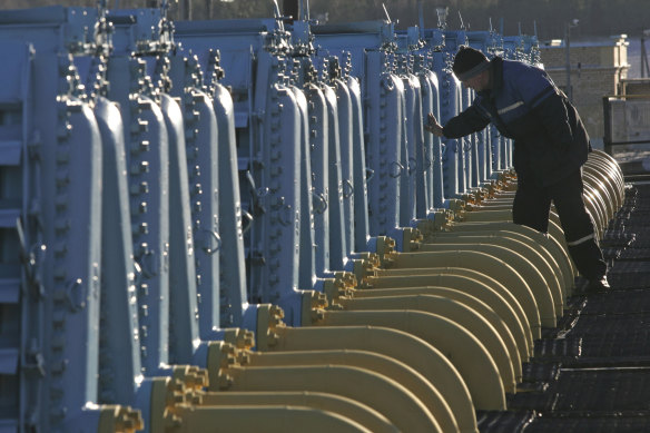 A Belarusian worker on duty at a gas compressor station 130 km southwest of the capital Minsk. Officials in Poland and Bulgaria say Russia is suspending their countries’ natural gas deliveries starting on Wednesday.