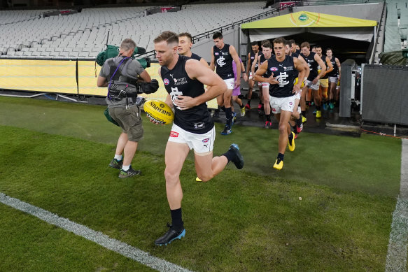 Long time between matches: Sam Docherty leads the Blues out for their only game in 2020.