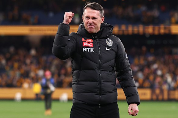 Craig McRae pumped his fist after the Magpies came away with a draw.