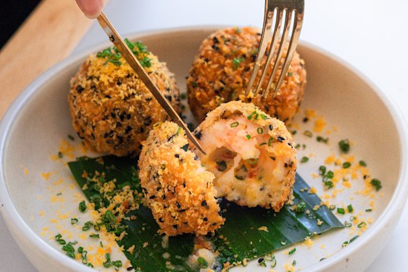 Ho Jiak’s prawn toast and molten salted duck egg.
