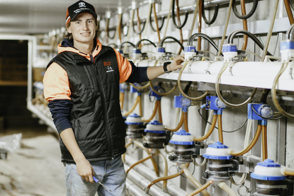 Hall assists in the maintenance of milk meter technology at the dairy.