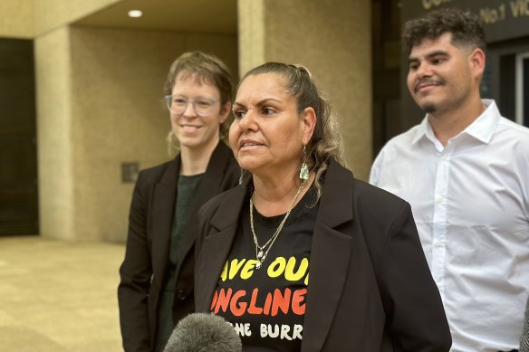 Cooper addressing the media outside court after the injunction was issued.