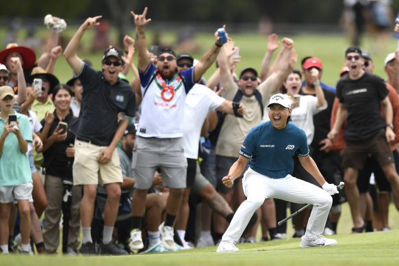 Min Woo Lee celebrates his eagle on the ninth hole.