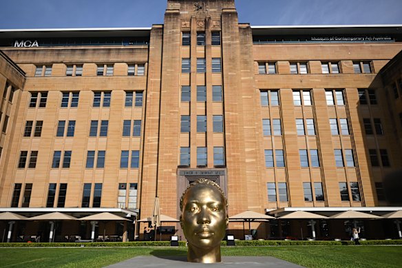 The exterior of the Museum of Contemporary Art with a large-scale public artwork by Thomas J. Price.
