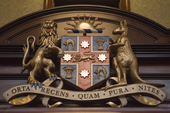 The emblems – including a lion and kangaroo – featured on the coat of arms symbolise NSW’s links to Britain and Australian identity.