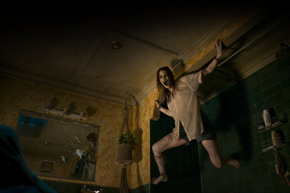 Alyssa Sutherland in a scene from Evil Dead Rise.