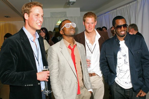 Prince William, Kanye West, Prince Harry and P Diddy pose for the media during a backstage party at Wembley Arena in north in 2007.