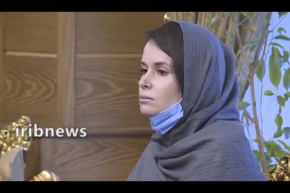 A screenshot from Iranian TV shows Moore-Gilbert waiting at an airport in Tehran before being returned to Australia.
