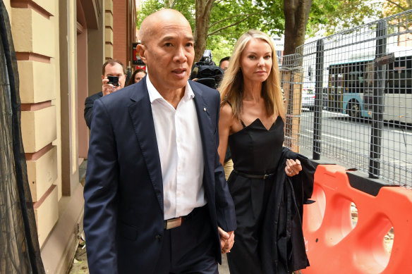 Charlie Teo and partner Traci Griffiths arrive at the neurosurgeon’s disciplinary hearing in Sydney on Monday.