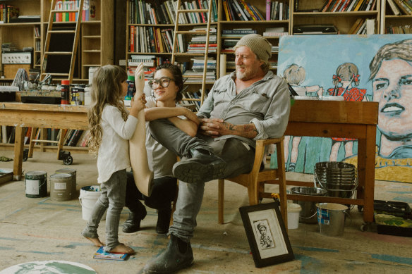 David and Yuge Bromley with one of their four children.