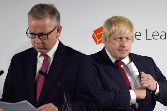 Cabinet minister Michael Gove, left, was forced to defend British Prime Minister Boris Johnson, right, following a report critical of the government's preparation for the coronavirus.