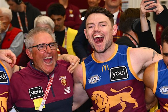 Chris Fagan and Lachie Neale celebrate the Lions preliminary final win.