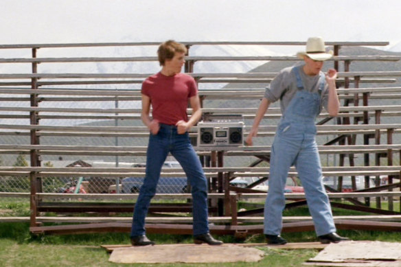 Christopher Penn gets some pointers from Kevin Bacon in Footloose.