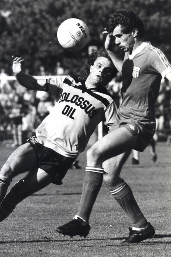 Postecoglou (right) in action for South Melbourne in 1984 against Heidelberg United’s Stuart Stevenson.