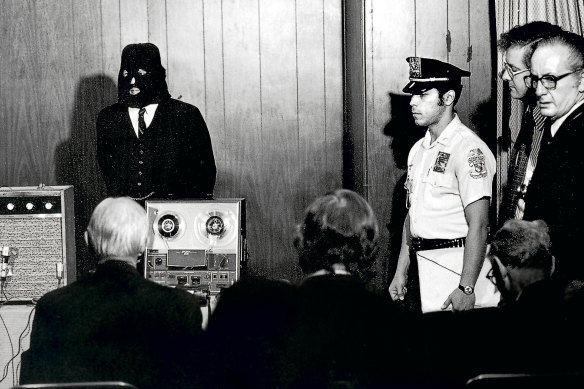 Alan Abel wears a mask posing as a White House official claiming to have the missing 181/2 minutes from the Watergate tapes. When the tape was played at a news conference, the reporters were greeted with silence. 