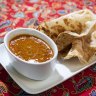 Roti canai and curry sauce.