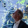 Inside the Qantas nerve centre as war causes traffic jams in the sky