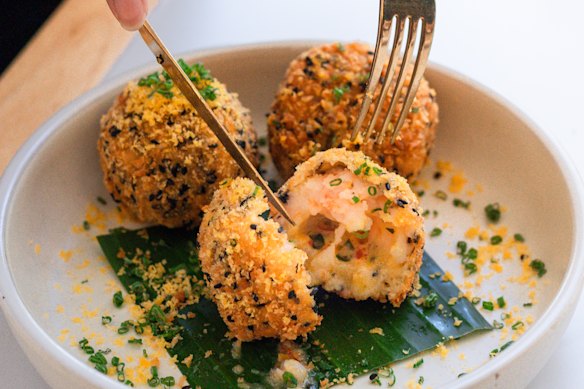 Inside Ho Jiak’s prawn toast and molten salted duck egg. 