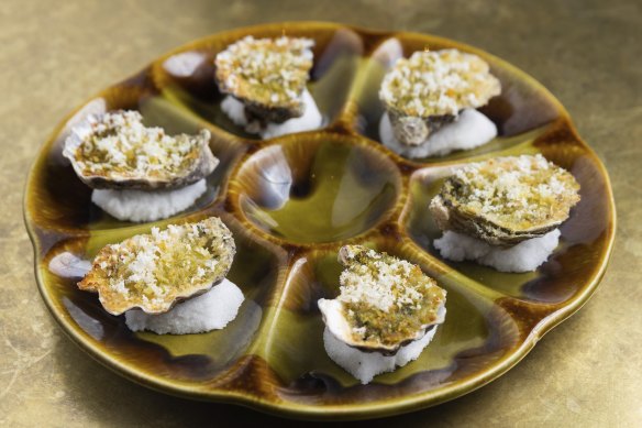 Baked oysters a la Poodle are a riff on oysters Rockefeller.