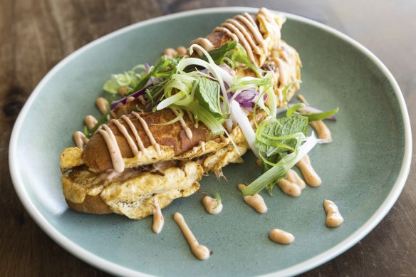 Roti John tiger roll filled with lamb shoulder and omelette.