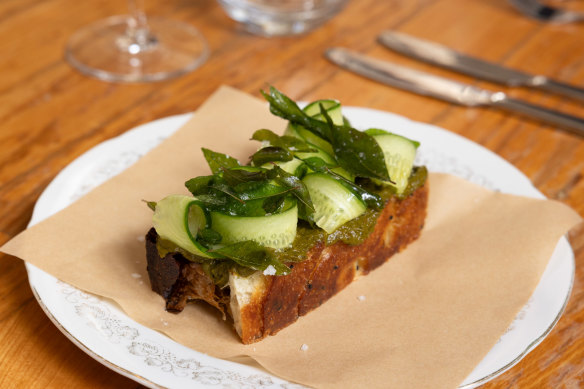 Nigella seed focaccia with bkeila, cucumber and fried curry leaf.