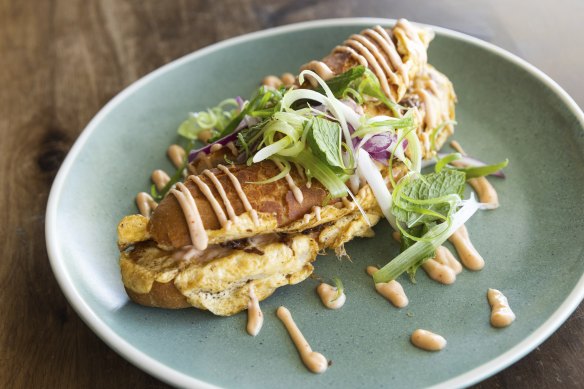 Roti John tiger roll filled with lamb shoulder and omelette.