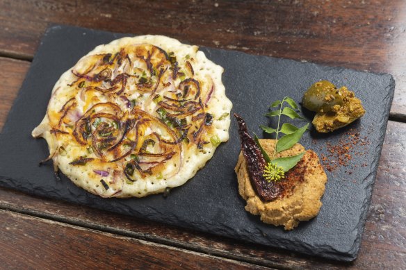 Uttapam with coconut chutney.