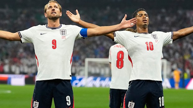 England’s Jude Bellingham celebrates with teammate Harry Kane.