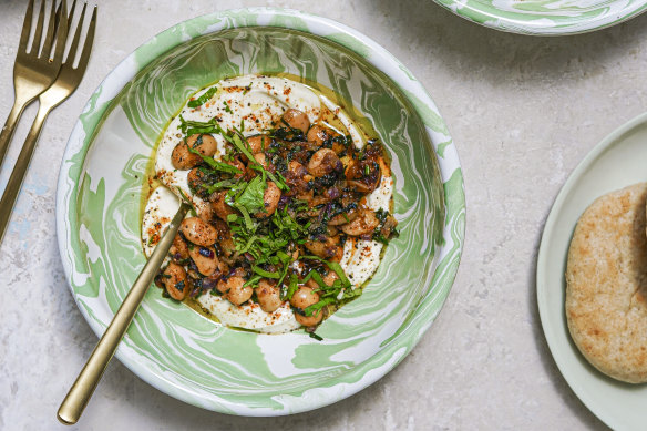 Spicy butter beans with cool yoghurt.