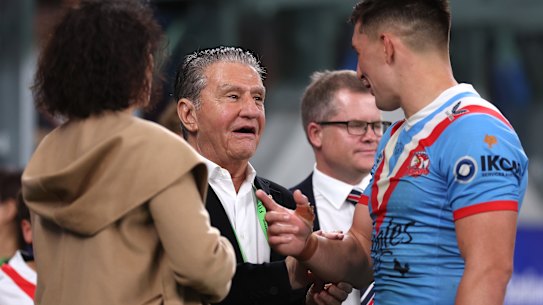 Roosters chairman Nick Politis talks to Victor Radley after a match.