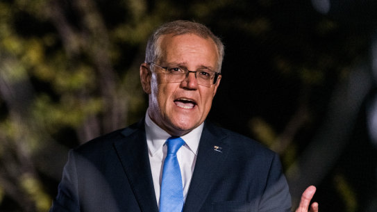 Prime Minister Scott Morrison speaking during a live television cross on Sunday night. 