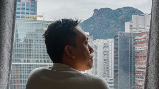 ‘I don’t think people can believe in freedom’: Lam Yin-Pong looks out at Hong Kong. On the horizon is the Lion Rock, a symbol of the resilient spirit of the city’s people.