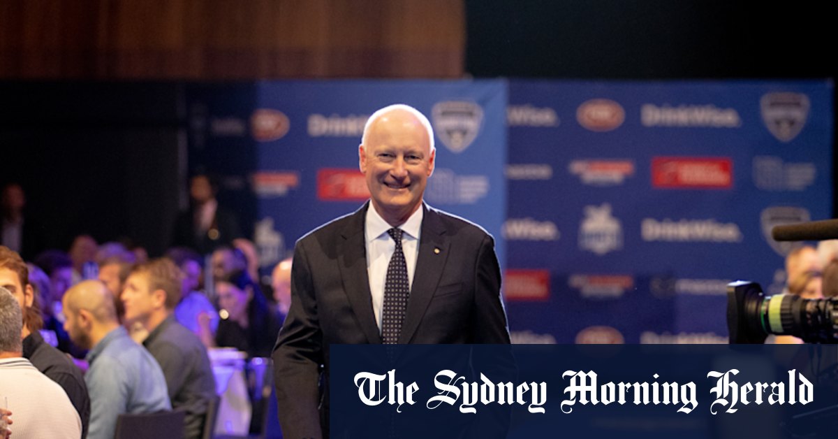 Qantas chair Richard Goyder and Nationals Senator Bridget McKenzie shake hands in grand final truce - Vimarsana News