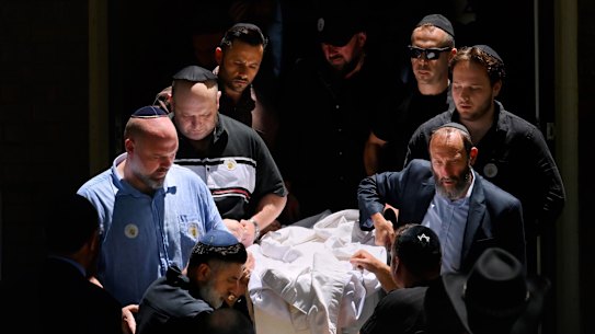 The casket of Matilda, the youngest victim of the Bondi massacre, leaves the Chevra Kadisha following her funeral.