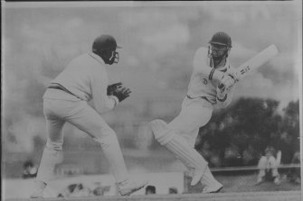 Tasmanian batsman Keith Bradshaw plays a pull shot past English fieldsman Wilf Slack at TCA ground, Hobart. December 19, 1986.