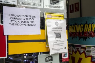 A sign on Chemist Warehouse Double Bay, Sydney, informs customers that it has no rapid antigen tests left. 