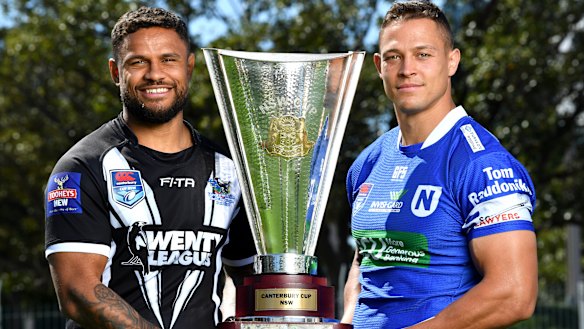 Newtown's Scott Sorenson and Wentworthville's Josh Hoffman with the Canterbury Cup. Tom Raudonikis can be seen on the Newtown sleeve.