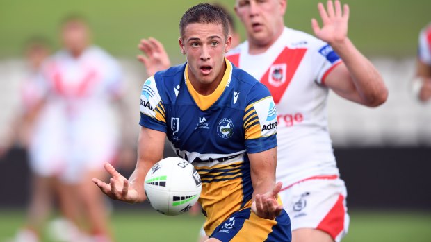 Jakob Arthur, son of Eels coach Brad, runs the ball during a pre-season trial.