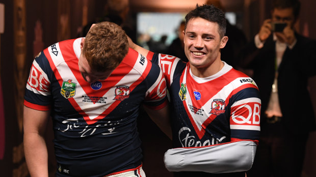 Extraordinary: Cooper Cronk in the tunnel with Dylan Napa. He played through the pain of a fractured scapula – an injury more associated with car crashes.