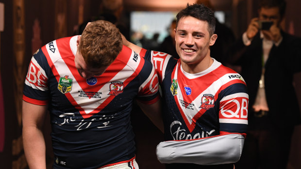 Questionable example: Cooper Cronk in the tunnel with Dylan Napa. He played through the pain of a fractured scapula – an injury more associated with car crashes.