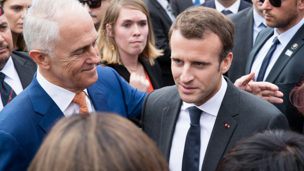 Prime Minsiter Malcolm Turnbull and French President Emmanuel Macron, meet veterans and their families at the commemoration ceremony . 