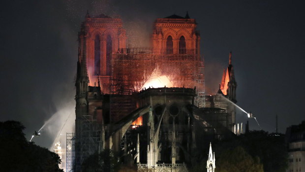 Fire engulfs the medieval Notre-Dame Cathedral in Paris.
