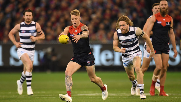 Hard and fast: Wayne Harmes helped Melbourne turn the tables on Geelong in their elimination final on Friday night.