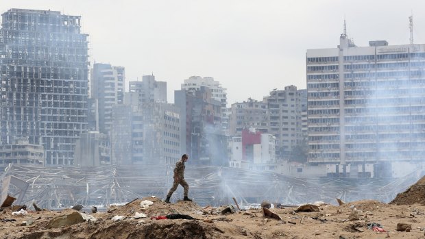 A soldier walks amid the devastation of the August 4 blast in the port of Beirut.