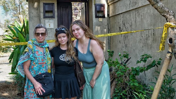 Australians Sally Richardson (left), Alice Bowers (middle) and Lucy Ockert gathered what they could and fled.